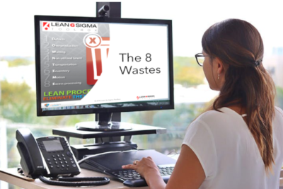 woman learning the 8 wastes online from lean six sigma toolbox 540x360