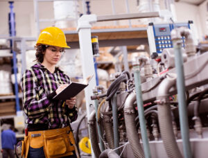 woman managing a manufacturing process in lean environment - lean six sigma toolbox